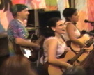 Songleaders at the Kutz Camp Institute lead a communal paraliturgical song session at the camp session's final banquet, Warwick, New York, 2000. Image from video © Judah Cohen.