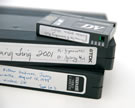 Most tape-based video tape recordings are quickly deteriorating and are on obsolete or near obsolete formats.  These recordings need to be digitally preserved as soon as possible to preserve their content.  Image © Alan Burdette.