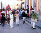 Procession celebrating the Day of Santa Bárbara through the neighborhood of Los Hoyos, Santiago de Cuba, 1999. Image © Kristina Wirtz.