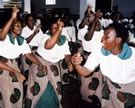 Mvano women singing and dancing during a Presbyterian women's meeting at Chitsime CCAP Church. Limbe, Malawi, 2003. Image © Clara Henderson.