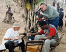 Gerhard Kubik and research team recording Raimon Campo with his homemade banjo. Phacassa/Changara, Mozambique, 2006. Image © Dr. Moya A. Malamusi.