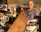 Ehsan Kousari with handcrafted <em>santour</em>, Indiana, USA, 2005. Image © Jon Kay.